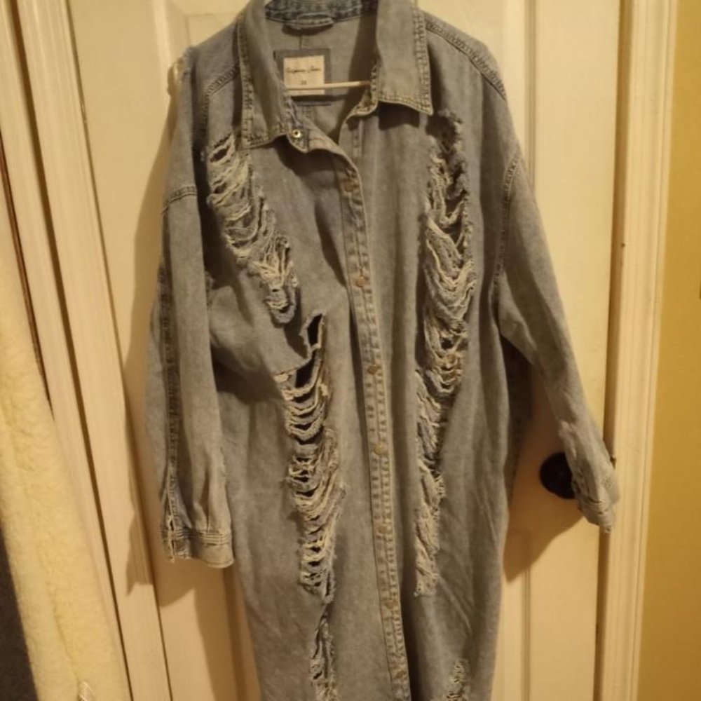 New long denim jacket never worn or opened.